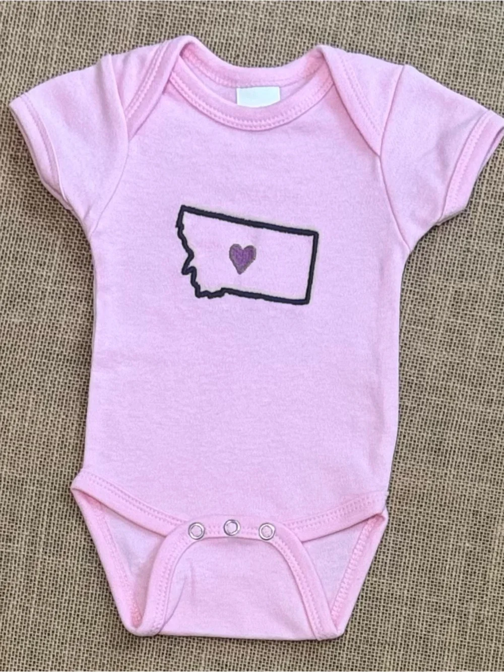Pink Baby One-Piece Bodysuit with Heart Montana State Graphic